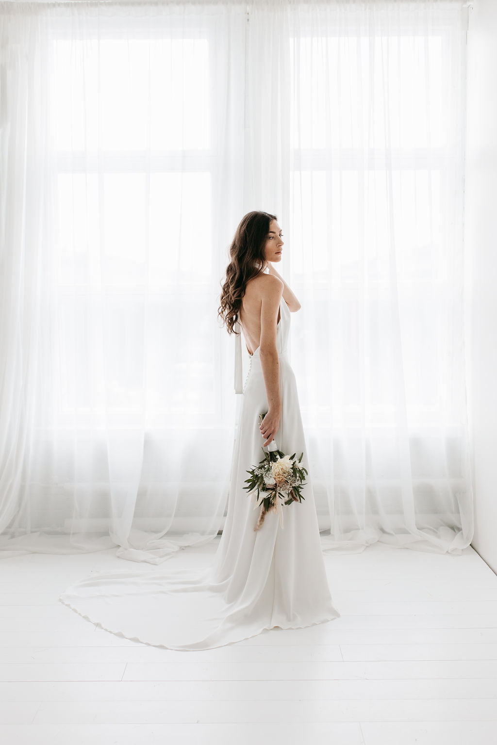 crepe halter neck wedding dress with open back